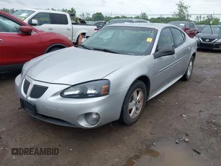 2006 Pontiac Grand Prix z VIN 2G2WP552961183915, wystawiony jako IAAI lot #42193498 z przebiegiem 243 565 mil mil oraz . Historia ofert i sprzedaży dostępna na DreamBid. Obrazek 2.