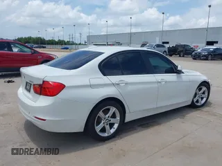 2013 BMW 3 Series 320i with VIN WBA3B1C50DK129576, listed as a IAAI auction lot 42393038 with 160,370 mi miles and . Bid and sale history available at DreamBid. Image 4.