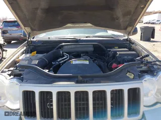 2010 Jeep Grand Cherokee Laredo with VIN 1J4PR4GK2AC125918, listed as a IAAI auction lot 41899078 with 236,229 mi miles. Bid and sale history available at carsss.com. Image 10.