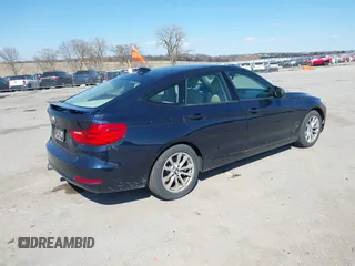 2014 BMW 3 Series 328i Gran Turismo xDrive with VIN WBA3X5C51ED557333, listed as a IAAI auction lot 41879900 with 101,737 mi miles and . Bid and sale history available at DreamBid. Image 4.