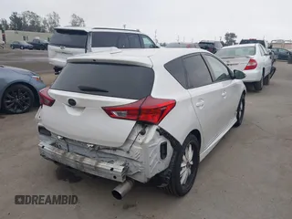2016 Scion iM with VIN JTNKARJE1GJ516789, listed as a IAAI auction lot 42034498 with 132,796 mi miles. Bid and sale history available at carsss.com. Image 4.