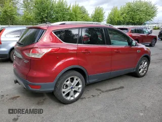 2015 Ford Escape Titanium with VIN 1FMCU9J94FUB92166, listed as a Copart auction lot 61371055 with 96,439 mi miles and Salvage title. Bid and sale history available at DreamBid. Image 3.