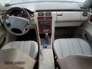 1998 Mercedes-Benz E 320 with VIN WDBJF25F0WA684027, listed as a Copart auction lot 82171114 with 259,427 mi miles and Salvage Title. Bid and sale history available at DreamBid. Image 8.