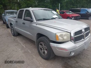 2007 Dodge Dakota SLT z VIN 1D7HE48P77S150303, wystawiony jako IAAI lot #42342137 z przebiegiem 219 528 mil mil oraz . Historia ofert i sprzedaży dostępna na DreamBid. Obrazek 1.