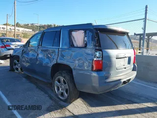 2016 Chevrolet Tahoe LS with VIN 1GNSCAKC0GR413515, listed as a IAAI auction lot 41249760 with 163,107 mi miles and . Bid and sale history available at DreamBid. Image 3.