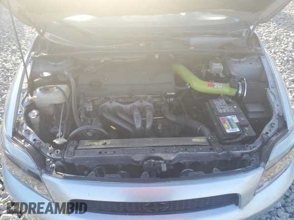 2006 Scion tC z VIN JTKDE177060137498, wystawiony jako Copart lot #52748195 z przebiegiem 194 151 mil mil oraz Szkoda całkowita • Salvage title. Historia ofert i sprzedaży dostępna na DreamBid. Obrazek 11.