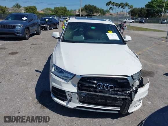 2017 Audi Q3 Premium with VIN WA1BCCFSXHR016914, listed as a IAAI auction lot 41784539 with 94,862 mi miles and . Bid and sale history available at DreamBid. Image 12.