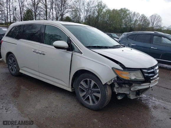 2015 Honda Odyssey Touring Elite with VIN 5FNRL5H98FB076428, listed as a IAAI auction lot 41998339 with 114,573 mi miles. Bid and sale history available at carsss.com. Image 1.