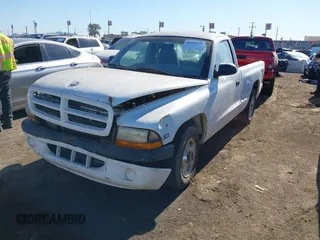 1999 Dodge Dakota SLT with VIN 1B7FL26X1XS190195, listed as a IAAI auction lot 41355250 with 223,174 mi miles. Bid and sale history available at carsss.com. Image 2.