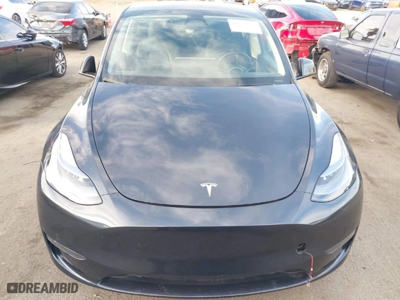 2024 Tesla Model Y with VIN 7SAYGDED7RF153140, listed as a IAAI auction lot 41476728 with NaN miles. Bid and sale history available at carsss.com. Image 13.