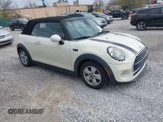 2016 MINI Convertible with VIN WMWWG5C51G3C19178, listed as a IAAI auction lot 41909039 with 87,533 mi miles and . Bid and sale history available at DreamBid. Image 1.