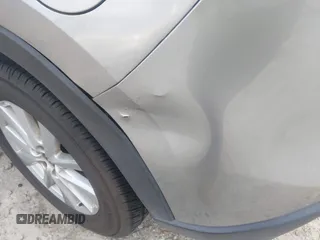 2015 Mazda CX-5 Touring with VIN JM3KE2CYXF0435583, listed as a IAAI auction lot 41737810 with 107,270 mi miles and . Bid and sale history available at DreamBid. Image 19.