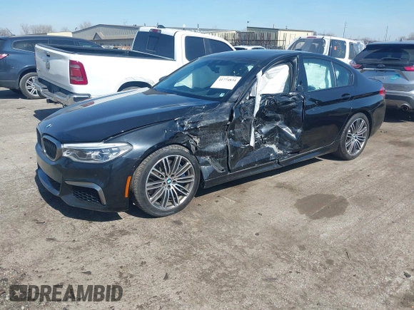 2019 BMW 5 Series M550i xDrive with VIN WBAJB9C51KB464879, listed as a IAAI auction lot 41774834 with 77,379 mi miles and . Bid and sale history available at DreamBid. Image 17.