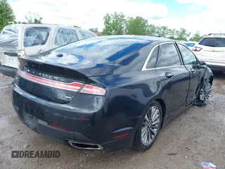 2015 Lincoln MKZ z VIN 3LN6L2G99FR625258, wystawiony jako IAAI lot #42308188 z przebiegiem 186 911 mil mil oraz . Historia ofert i sprzedaży dostępna na DreamBid. Obrazek 4.