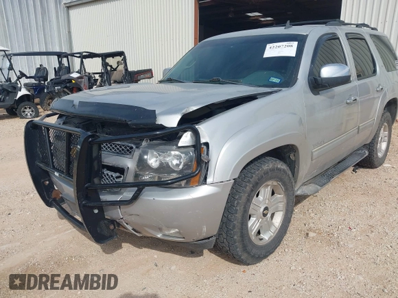 2011 Chevrolet Tahoe LT with VIN 1GNSCBE08BR369781, listed as a IAAI auction lot 42207208 with 162,038 mi miles and . Bid and sale history available at DreamBid. Image 6.