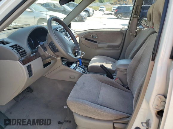 2005 Suzuki XL7 LX z VIN JS3TX92VX54100730, wystawiony jako Copart lot #74913534 z przebiegiem 91 838 mil mil oraz Szkoda całkowita • Salvage title. Historia ofert i sprzedaży dostępna na DreamBid. Obrazek 7.