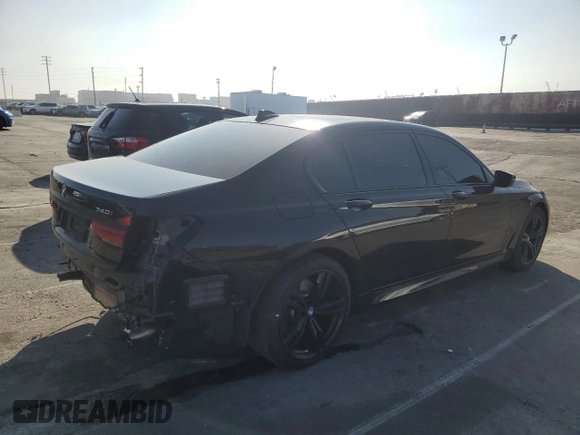 2016 BMW 7 Series 740i с VIN WBA7E2C54GG504200, выставлен на аукционе Copart как лот 46369885 с пробегом 70 606 миль миль и Списание • Salvage title. История ставок и продаж доступна на DreamBid. Изображение 3.