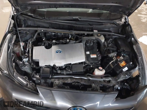 2021 Toyota Prius L Eco z VIN JTDKAMFU9M3132587, wystawiony jako IAAI lot #41637275 z przebiegiem 84 203 mil mil oraz . Historia ofert i sprzedaży dostępna na DreamBid. Obrazek 10.