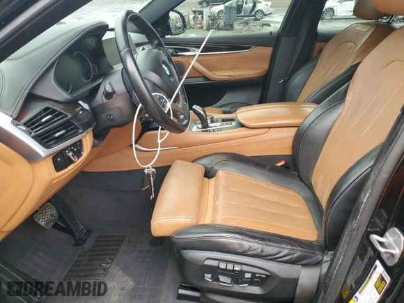 2017 BMW X6 sDrive35i with VIN 5UXKU0C36H0G69163, listed as a Copart auction lot 87044784 with 99,452 mi miles and Salvage Title. Bid and sale history available at carsss.com. Image 7.