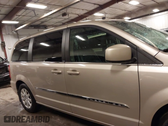 2014 Chrysler Town & Country Touring with VIN 2C4RC1BG3ER295722, listed as a IAAI auction lot 41705820 with 142,587 mi miles and . Bid and sale history available at DreamBid. Image 14.