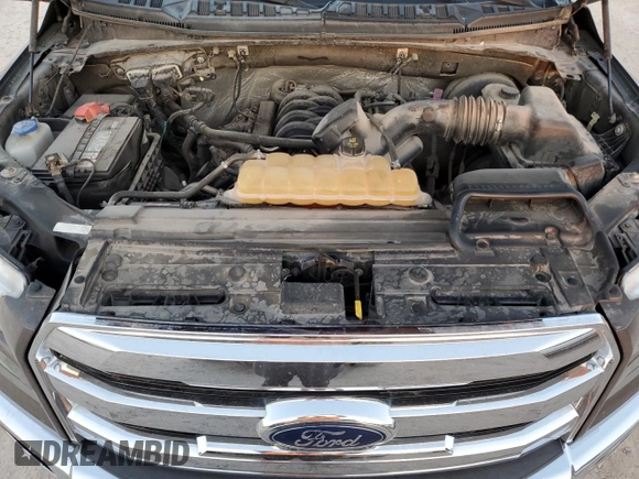 2015 Ford F-150 XL with VIN 1FTEW1CF5FKE08517, listed as a Copart auction lot 52567865 with 99,904 mi miles and Salvage title. Bid and sale history available at DreamBid. Image 11.
