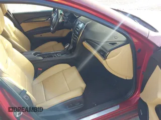2014 Cadillac ATS Standard AWD z VIN 1G6AG5RX1E0166213, wystawiony jako IAAI lot #42025236 z przebiegiem 110 061 mil mil oraz . Historia ofert i sprzedaży dostępna na DreamBid. Obrazek 5.