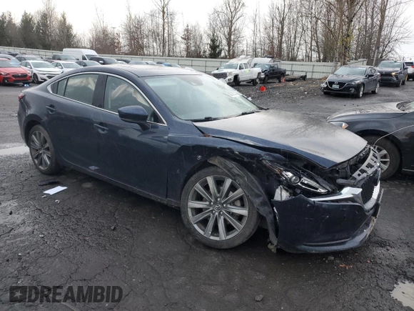 2020 Mazda 6 Grand Touring with VIN JM1GL1TY3L1513321, listed as a Copart auction lot 86398054 with 57,407 mi miles and Salvage Title. Bid and sale history available at DreamBid. Image 4.