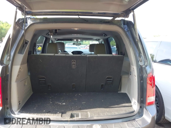 2013 Honda Pilot EX-L with VIN 5FNYF3H59DB038966, listed as a IAAI auction lot 42461394 with 142,684 mi miles and . Bid and sale history available at DreamBid. Image 19.