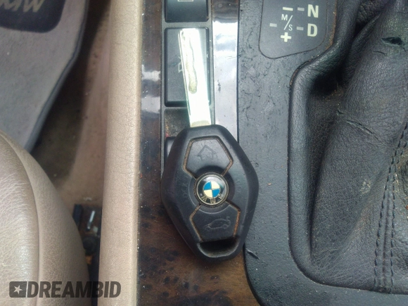 2002 BMW 3 Series 325i with VIN WBAET37482NG72157, listed as a IAAI auction lot 41648030 with 1 mi miles. Bid and sale history available at carsss.com. Image 11.