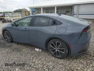 2023 Toyota Prius LE z VIN JTDACAAU1P3003548, wystawiony jako Copart lot #55927825 z przebiegiem 42 880 mil mil oraz Szkoda całkowita • Salvage title. Historia ofert i sprzedaży dostępna na DreamBid. Obrazek 2.
