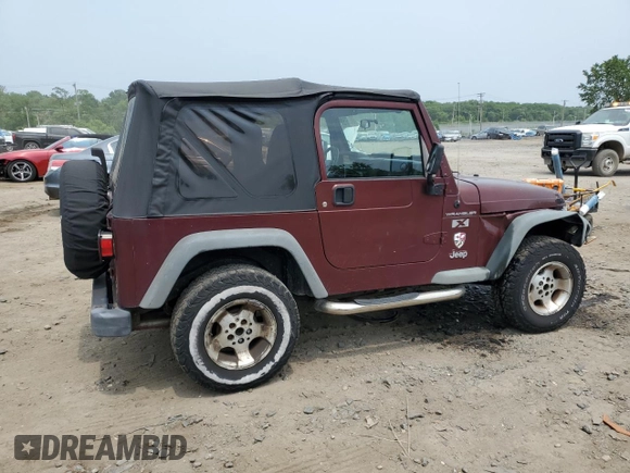 2002 Jeep Wrangler X z VIN 1J4FA39S42P773815, wystawiony jako Copart lot #60016255 z przebiegiem 174 803 mil mil oraz Szkoda całkowita • Salvage title. Historia ofert i sprzedaży dostępna na DreamBid. Obrazek 3.