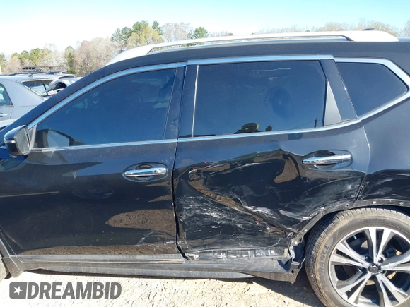 2017 Nissan Rogue SL with VIN 5N1AT2MT0HC856366, listed as a IAAI auction lot 41894810 with 76,914 mi miles and . Bid and sale history available at DreamBid. Image 14.