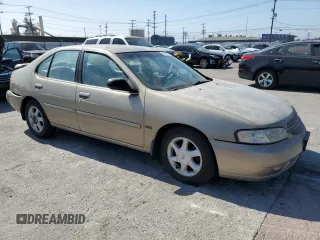 2001 Nissan Altima GXE with VIN 1N4DL01D51C242850, listed as a Copart auction lot 73544874 with 157,805 mi miles and Salvage Title. Bid and sale history available at carsss.com. Image 4.