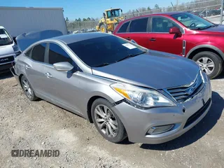 2013 Hyundai Azera z VIN KMHFG4JGXDA224977, wystawiony jako IAAI lot #41585721 z przebiegiem 151 594 mil mil oraz . Historia ofert i sprzedaży dostępna na DreamBid. Obrazek 1.
