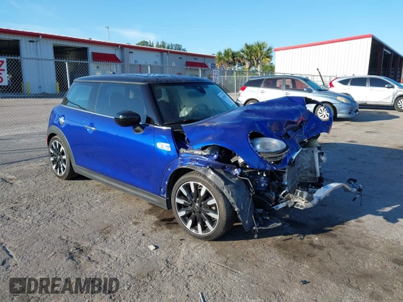 2020 MINI Hardtop Cooper S z VIN WMWXR5C09L2M32640, wystawiony jako IAAI lot #41463311 z przebiegiem 62 050 mil mil oraz . Historia ofert i sprzedaży dostępna na DreamBid. Obrazek 1.