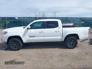 2023 Toyota Tacoma SR with VIN 3TMCZ5AN2PM642205, listed as a IAAI auction lot 42167945 with 10,595 mi miles and . Bid and sale history available at DreamBid. Image 15.