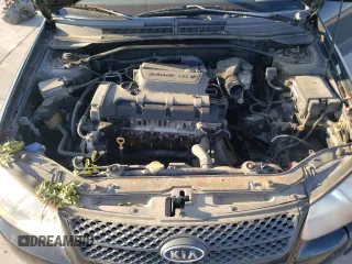 2007 Kia Spectra with VIN KNAFE161375007164, listed as a Copart auction lot 71791154 with 165,502 mi miles and Clean Title. Bid and sale history available at carsss.com. Image 11.