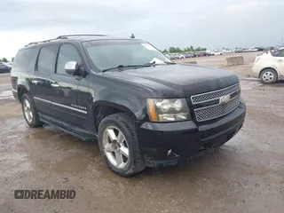 2011 Chevrolet Suburban LTZ z VIN 1GNSCKE02BR370652, wystawiony jako IAAI lot #42473065 z przebiegiem 250 085 mil mil oraz . Historia ofert i sprzedaży dostępna na DreamBid. Obrazek 1.