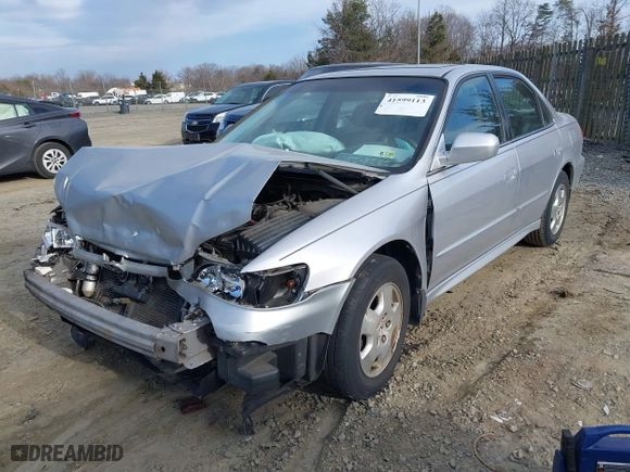 2002 Honda Accord Sdn EX w/Leather with VIN 1HGCG16572A057361, listed as a IAAI auction lot 41599113 with 262,533 mi miles. Bid and sale history available at carsss.com. Image 17.