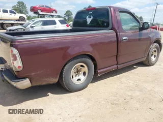 1998 Ford F-150 with VIN 1FTZF1725WNB72765, listed as a IAAI auction lot 42056766 with 210,459 mi miles and . Bid and sale history available at DreamBid. Image 4.