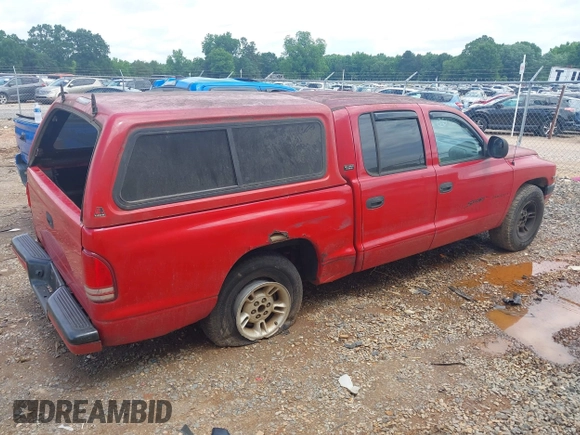 2000 Dodge Dakota Sport with VIN 1B7GL2AN7YS607119, listed as a IAAI auction lot 42377808 with 287,892 mi miles and . Bid and sale history available at DreamBid. Image 4.