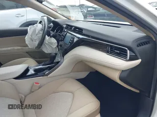 2019 Toyota Camry LE with VIN 4T1B11HK2KU743445, listed as a IAAI auction lot 42129688 with 284,938 mi miles and . Bid and sale history available at DreamBid. Image 5.