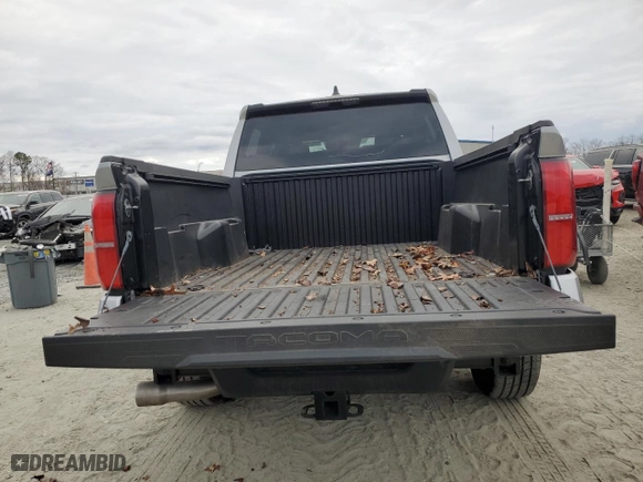 2024 Toyota Tacoma 4WD SR5 with VIN 3TYLB5JNXRT012816, listed as a Copart auction lot 46337705 with 1,702 mi miles and Salvage Title. Bid and sale history available at carsss.com. Image 6.