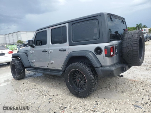 2018 Jeep Wrangler Unlimited Sport S with VIN 1C4HJXDG7JW179393, listed as a Copart auction lot 52069655 with 141,831 mi miles and Salvage Title. Bid and sale history available at carsss.com. Image 2.