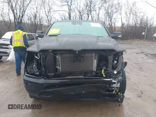 2021 Ram 1500 Laramie with VIN 1C6SRFJT6MN580803, listed as a IAAI auction lot 41207914 with 56,891 mi miles and . Bid and sale history available at DreamBid. Image 13.