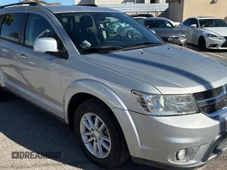 2013 Dodge Journey SXT with VIN 3C4PDDBG4DT593312, listed as a Copart auction lot 56431775 with 131,651 mi miles and Clean Title. Bid and sale history available at DreamBid. Image 1.