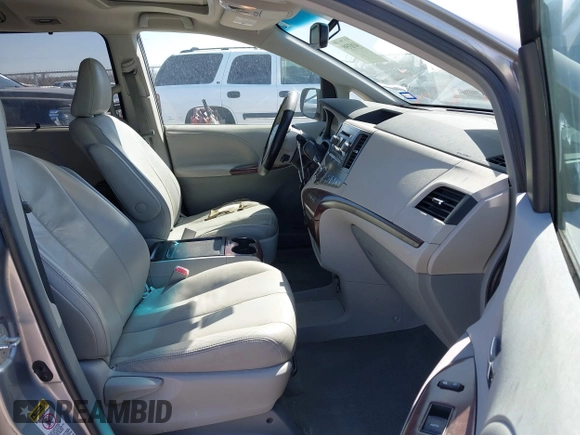 2011 Toyota Sienna XLE AAS with VIN 5TDYK3DCXBS172586, listed as a IAAI auction lot 41835992 with 203,599 mi miles. Bid and sale history available at carsss.com. Image 5.