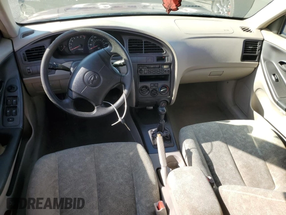 2001 Hyundai Elantra GLS z VIN KMHDN45D41U107399, wystawiony jako Copart lot #52658745 z przebiegiem 65 459 mil mil oraz Szkoda całkowita • Salvage title. Historia ofert i sprzedaży dostępna na DreamBid. Obrazek 8.
