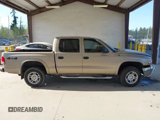 2003 Dodge Dakota SLT with VIN 1D7HG48N03S344321, listed as a IAAI auction lot 42074421 with 96,489 mi miles and . Bid and sale history available at carsss.com. Image 13.