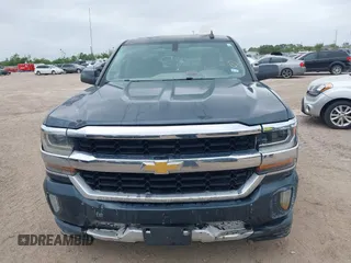 2018 Chevrolet Silverado 1500 LT with VIN 1GCRCREC9JZ105218, listed as a IAAI auction lot 40778682 with 124,621 mi miles and . Bid and sale history available at DreamBid. Image 12.